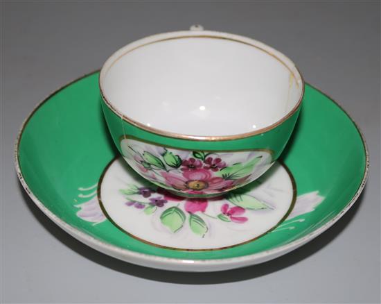 A Russian Gardiner cup and saucer (a.f.)